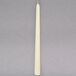 A pack of 12 ivory Hyoola taper candles with long stems.