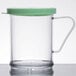 A clear plastic Cambro shaker with a green lid.