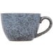 A close-up of a grey speckled 10 Strawberry Street Biseki stoneware cup with a handle.