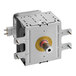 A metal Amana magnetron with a yellow and silver center.