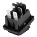 A black Cooking Performance Group Rocker Switch with metal pins.