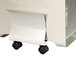 A silver metal Fellowes CPU stand with casters.