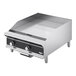 A silver and black Vollrath countertop griddle with manual controls.