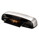 A Fellowes Saturn 3i laminator in black and silver.
