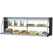 A Turbo Air black display case filled with a variety of pastries.