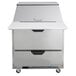 A Beverage-Air stainless steel refrigerated sandwich prep table with two drawers.