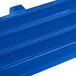 A navy blue plastic tray rail for a Cambro table.