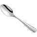 An Acopa Edgeworth stainless steel teaspoon with a silver handle.