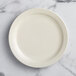 Choice 10 1/2" Ivory (American White) Narrow Rim Stoneware Plate - 12/Case Main Thumbnail 3
