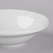 A Libbey Basics bright white porcelain fruit bowl with a white rim.