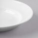 A Libbey Basics bright white porcelain soup bowl with a white rim.