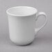 A Libbey bright white porcelain tall cup with a handle.