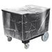 A black plastic Cambro dish caddy on wheels with a plastic cover.
