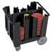 A black plastic Cambro dish cart with a stack of plates inside.
