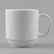 A Libbey bright white mug with a wavy design on the handle.
