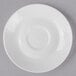 A white Libbey porcelain saucer with a circle on the rim.