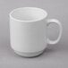 A close-up of a Libbey white porcelain mug with a handle.