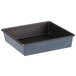 A black rectangular metal cake pan with a square shape and a black lid.