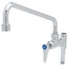 A T&S chrome add-on faucet with a blue label.
