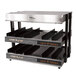 A silver metal Global Solutions by Nemco heated merchandiser with two shelves holding trays.