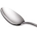 A Reed & Barton stainless steel spoon with a silver handle and spoon.