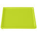 A lime green rectangular cast aluminum cooling platter.