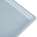 A gray rectangular cast aluminum platter on a white surface.