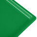 A green cast aluminum rectangular cooling platter with a flat surface.