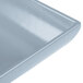 A close up of a gray cast aluminum rectangular platter.