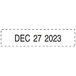 A white sticker with the date December 27, 2323 stamped in black using a Trodat self-inking date stamp.