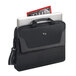 A black Solo Pro Slim briefcase with a laptop inside.