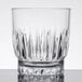 A close up of a Libbey Winchester rocks glass with a diamond pattern.