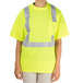A person wearing a Cordova lime yellow high visibility safety shirt.