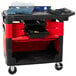 A black Rubbermaid TradeMaster cart with a black tool box.