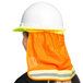 A woman wearing a Cordova orange high visibility neck shade and a reflective vest over a hard hat.