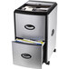 A black and silver Storex metal mobile filing cabinet with two drawers and an organizer tray.