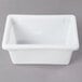 A white plastic food storage box with a lid.