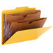 A yellow Smead classification folder with brown and purple folders inside.