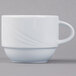 A Schonwald white porcelain coffee cup with a curved handle.