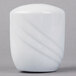 A white porcelain pepper shaker with a curved design.