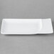 A white rectangular Schonwald porcelain platter with curved edges.