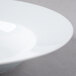 A Schonwald white porcelain bowl with a rim.