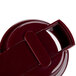 A Tablecraft maroon plastic lid with a handle.