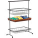 A gray powder coated iron rectangular 3-tier pane stand holding a tray of food.