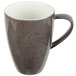 A Schonwald dark grey porcelain coffee mug with a speckled design and handle.
