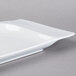 A white rectangular Schonwald porcelain platter with a contoured edge.