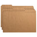 Three brown Smead legal size file folders with assorted tabs.