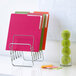 A stack of Smead Organized Up heavy weight file folders in assorted bright colors.