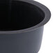 A black round Matfer Bourgeat mini cake pan with a lid.