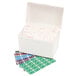A white box of Smead assorted monthly end tab file folder labels in various colors.